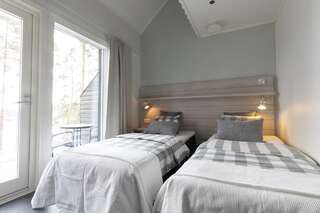 Отели типа «постель и завтрак» Varjola Holiday Center Лаукаа Стандартный двухместный номер с 2 отдельными кроватями-1